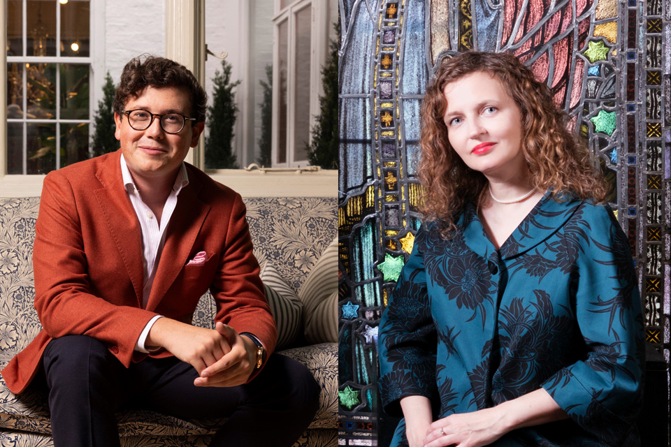 Headshots of a man with dark curly hair in a suit and a woman with dark curly hair wearing a blue blouse